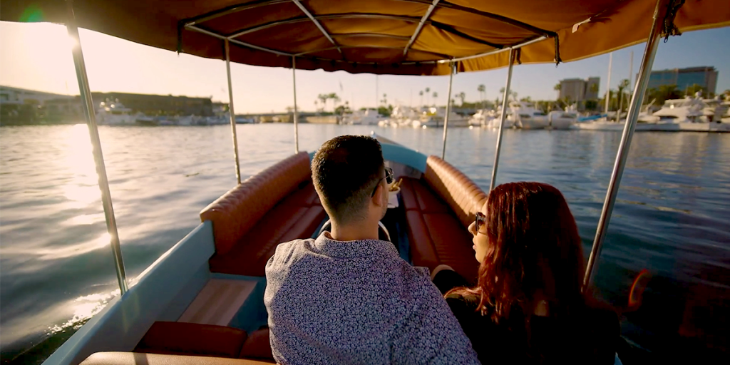 Couple riding a Fantail 217 on Valentine's Day in Balboa Harbor